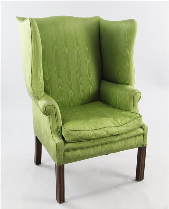 A George III style wingback armchair,